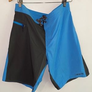 Men’s Patagonia swim trunks / board shorts. Blue and gray color block. Size 34
